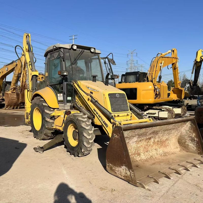 Original Color New Holland LB85 Backhoe Loader 4 Wheels Drive In Good Condition