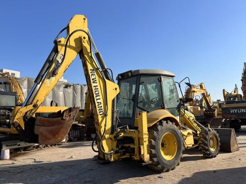 Original Color New Holland LB85 Backhoe Loader 4 Wheels Drive In Good Condition