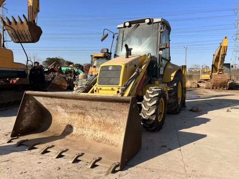 Original Color New Holland LB85 Backhoe Loader 4 Wheels Drive In Good Condition